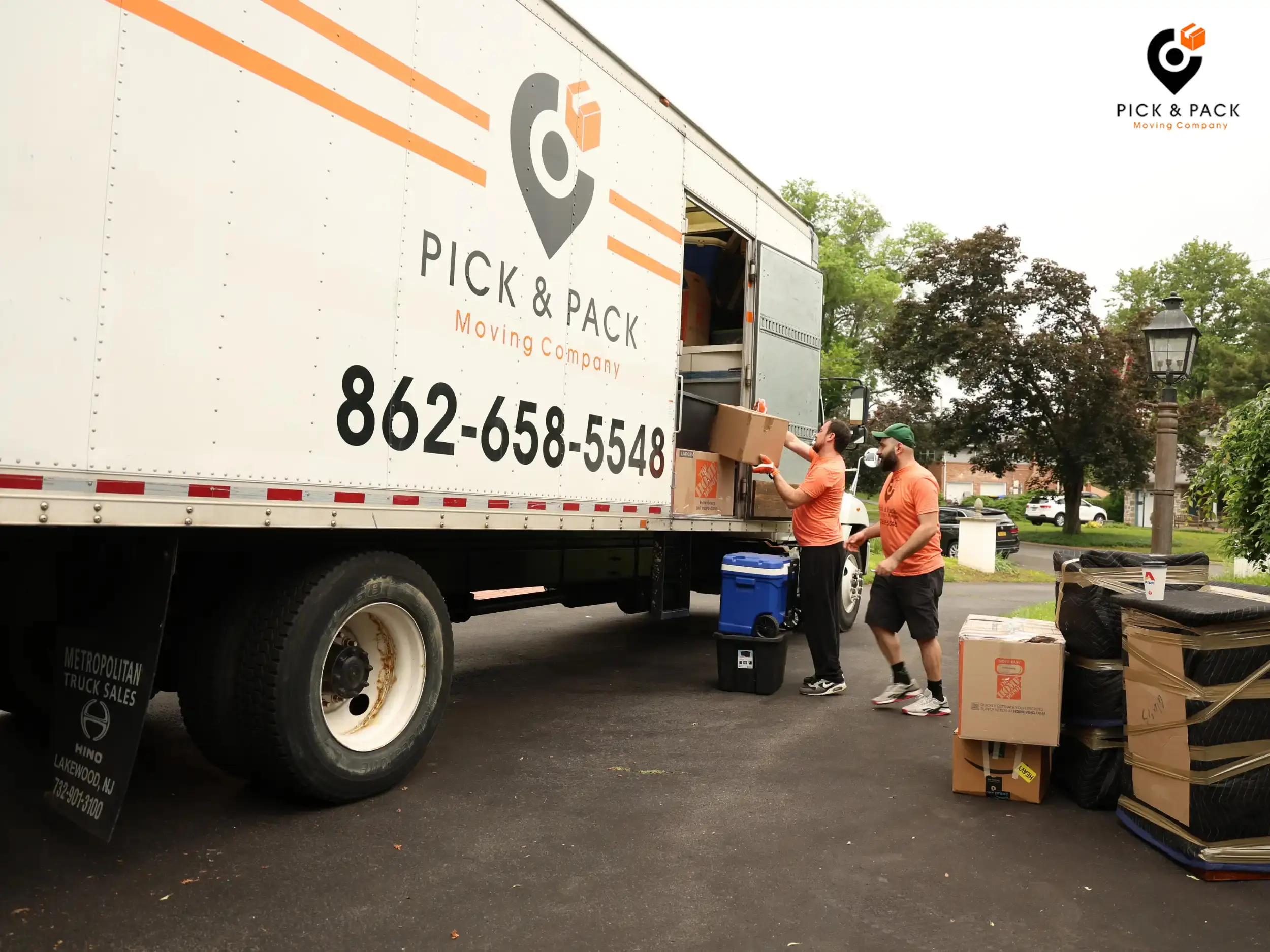 Attachment Details Professional-movers-loading-a-Pick-and-Pack-truck