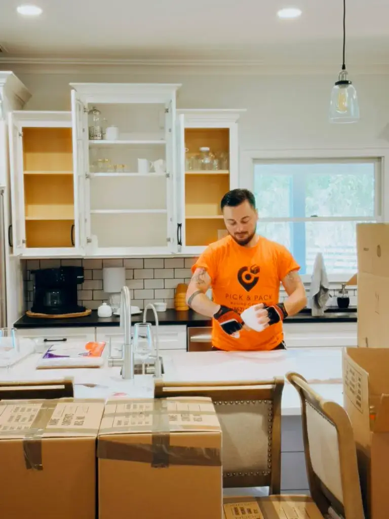 Pick and Pack mover packing kitchen items during a Toms River residential move