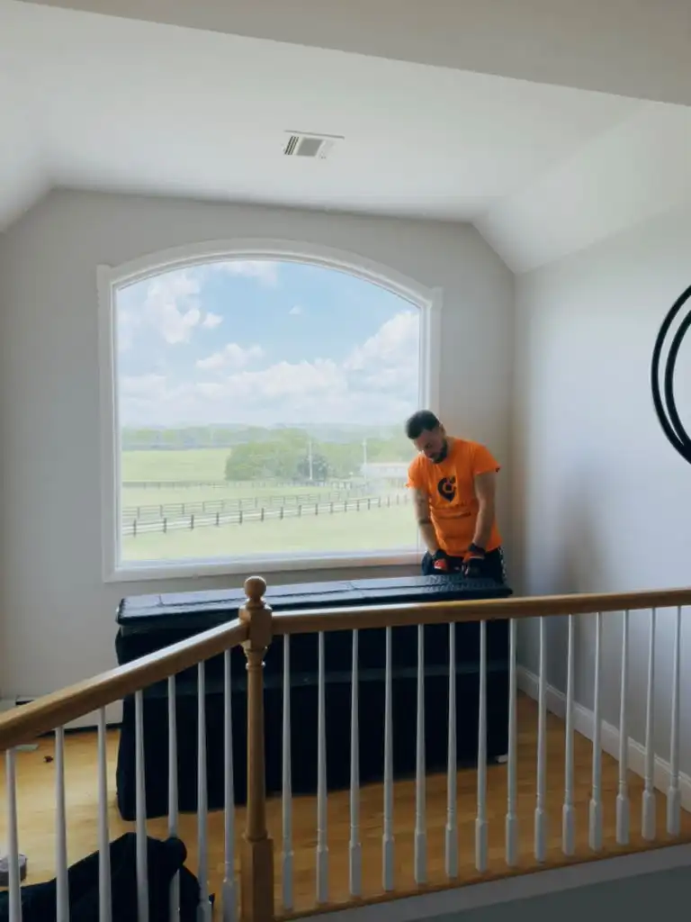 Pick and Pack mover padding and wrapping furniture before a Jersey City move