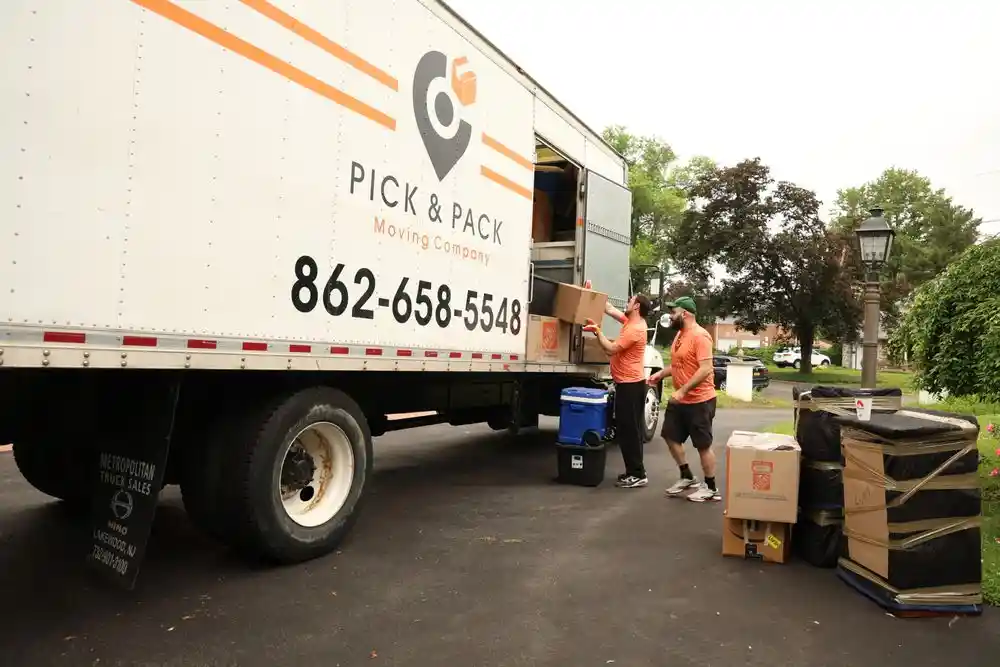 Pick and Pack movers loading boxes into the truck during a Princeton, NJ move