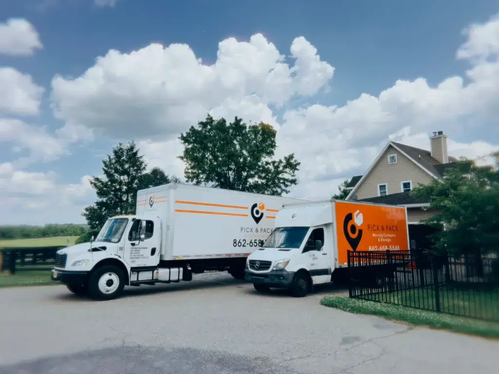 Pick and Pack moving trucks parked at a home in Ocean County, NJ