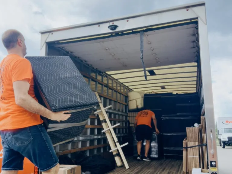 River Edge movers loading the truck during a residential move